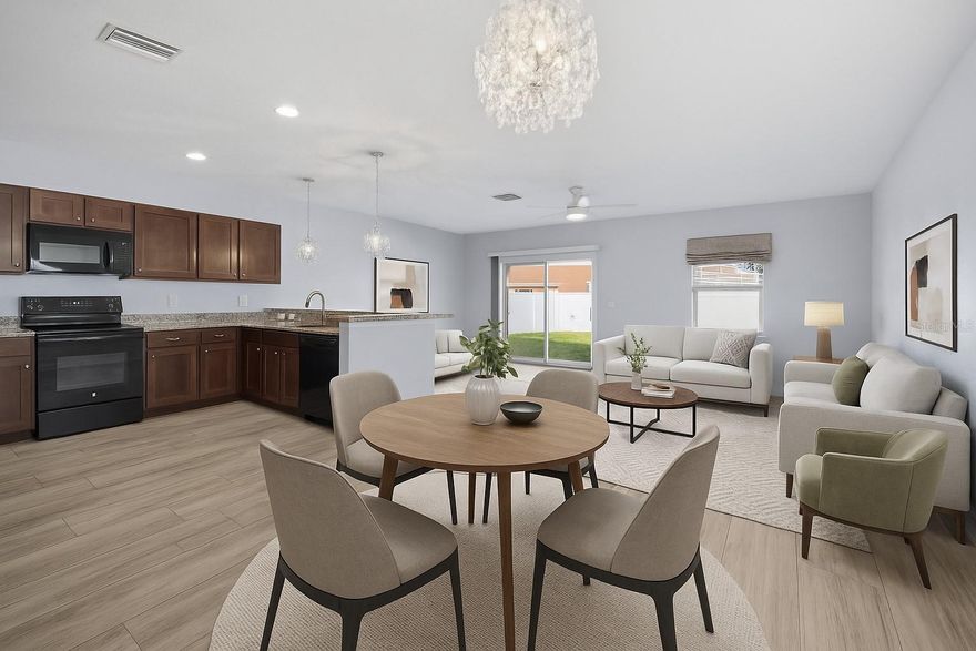 Completely Remodeled - Better than New as many upgrades made from original builder model. You will be the envy of the neighborhood. This 2-Story Cottage Design Home features Upgrades Galore including: Hurricane/Storm & Energy Efficient Windows and Slider. Newer AC With Air Purification System, Spray Foam Insulated Exterior Walls for added energy efficiency. Wood-Look Tile Floors throughout First Floor. Freshly Painted Interior. Premium Carpet in Bedrooms. Custom-Modern Tiled Shower in Master Bath with top line Fixtures. Beautifully updated kitchen boasting granite countertops, espresso wood cabinets, and a full suite of matching black appliances. The open layout connects seamlessly to the main living area — perfect for entertaining or everyday convenience. You will find elegant lighting fixtures, modern remote controlled ceiling fans and upgraded window treatments complimenting the open concept living spaces. When you are ready to step outside, you have a large fenced back-yard providing privacy and great space for family and friend gatherings. Room for a pool too! To finish off, you have new vinyl siding on upper exterior, paver driveway and a garage with painted floor. DO NOT PASS on this great opportunity to make this home your own. Excellent home for First Time Homeowners, Families or Snowbirds. Schedule your private tour today! One or More Photos Virtually Staged