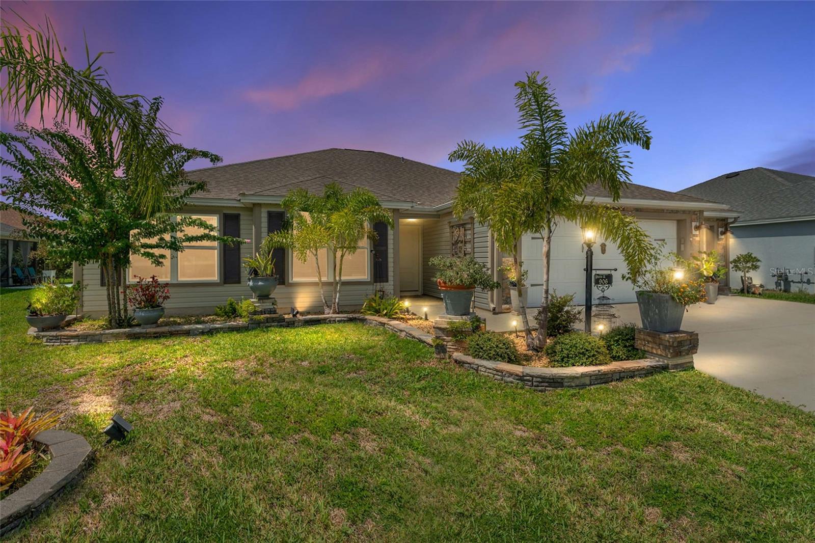 Spectacular Home in Cason Hammock, The Villages
Located in the desirable Village of Cason Hammock within Southern Oaks, this stunning 3 bedroom, 2 bath home combines luxury and convenience just moments from the Southern Oaks Championship Golf Course.
Distinctive custom stone accents set this home apart, adding architectural interest and elevated curb appeal. Inside, a spacious open floor plan welcomes you with wood-look tile flooring throughout the main living areas and modern upgraded light fixtures that enhance the home’s stylish ambiance.
The designer kitchen is a chef’s dream, boasting beautiful cabinetry, granite countertops, a striking backsplash, and a high-end gas stove, ideal for both everyday living and entertaining.
The master suite offers a peaceful retreat with rich hardwood floors and a recently updated tile shower in the en-suite bath.
Step outside to the expansive 32x11 screened lanai, perfect for outdoor dining, lounging, or entertaining. Lanai furniture is included, making this outdoor space ready to enjoy from day one.
This exceptional home also includes a Yamaha gas golf cart with QuieTech and a washer and dryer, adding to the convenience and value of this move-in-ready property in one of The Villages’ most sought after communities. Schedule your showing today!