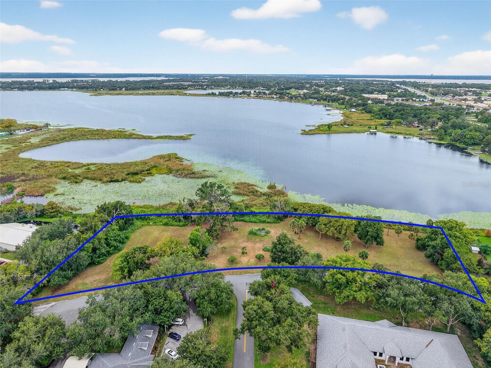 Discover an exceptional opportunity to own five vacant waterfront lots on beautiful Lake Saunders in Mount Dora- total 2.2 +/- acres with over 500 feet of lake frontage. This rare offering provides direct lake frontage and endless potential for development or private use. Zoned RP with Future Land Use: Urban High Density – allowing for a variety of residential development options. Five Individual Parcels offer flexibility to build custom homes, multifamily units, or hold for future appreciation and investment opportunity. Direct Lake Saunders Frontage – ideal for waterfront living, recreation, and value enhancement. Enjoy breathtaking views and access to fishing, boating, and watersports. Prime Location just minutes to historic Downtown Mount Dora and Tavares, shopping, dining, and major highways for easy access to Orlando and surrounding areas. Public Utilities Nearby supporting efficient future development. Lake Saunders is known for its scenic beauty and recreational lifestyle, and these parcels represent one of the few remaining opportunities to build along its shoreline. Whether you’re an investor, builder, or developer, this offering is a chance to create a high-value residential community or private lakefront retreat.
This is offered as a package for all 5 lots. Each lot is just under .50 acre +/-.