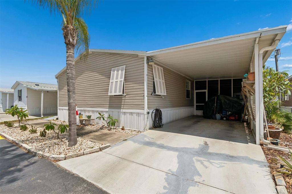 Photo of 12701 126th Avenue #63, Largo, FL 33774 (MLS # TB8510131)