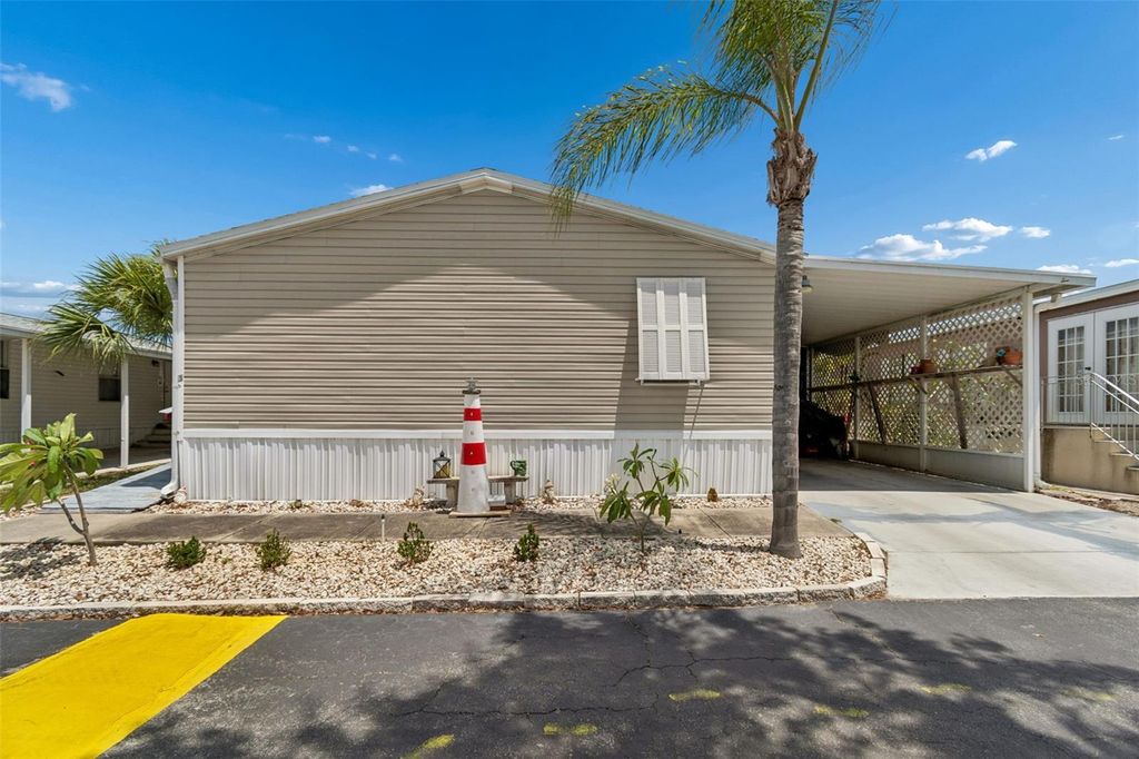 Photo of 12701 126th Avenue #63, Largo, FL 33774 (MLS # TB8510131)