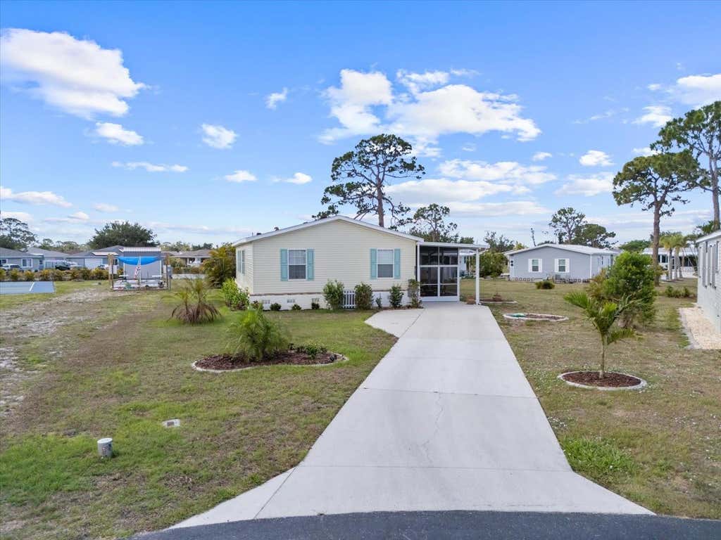 Photo of 9182 Pinehaven Way, Englewood, FL 34224 (MLS # C7529655)