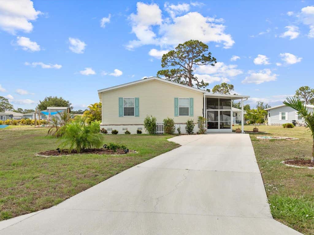 Photo of 9182 Pinehaven Way, Englewood, FL 34224 (MLS # C7529655)