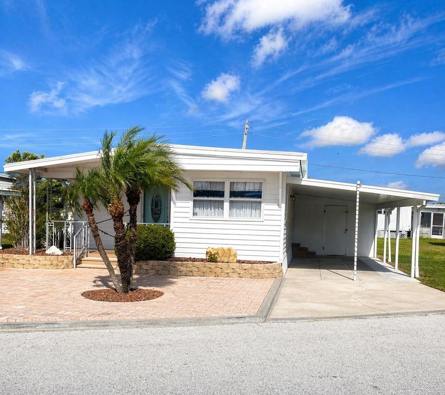 Spacious and well-maintained 2-bedroom, 1.5-lot home in the desirable 55+ Trailer Estates community. This furnished property features a new 2024 carport, beautifully renovated bathrooms, and a bright kitchen that opens to the dining room. The spacious living room and additional pantry/storage area provide ample room for comfortable living. Enjoy the charm of a covered front porch, stylish pavers along the front, and updated electrical with new panels and wiring. Ductwork replaced in 2024, and the home includes a 2017 heat pump with humidistat for year-round comfort. The washer and dryer are conveniently located in the shed under the carport. Move-in ready with plenty of storage and Florida coastal charm!

Located in Trailer Estates, a Special Park and Recreation District governed under Chapter 418, Florida Statutes, residents own their land—no lot rent, CDD, or HOA fees. The annual park tax covers cable, high-speed internet, trash pickup, fire and rescue services, and access to outstanding amenities including a marina with rentable boat slips, private beach, pool, hot tub, fitness center, shuffleboard, bocce ball, pickleball, woodshop, and nearly 60 active clubs and social events. Experience one of Sarasota Bay’s most vibrant and welcoming 55+ communities.