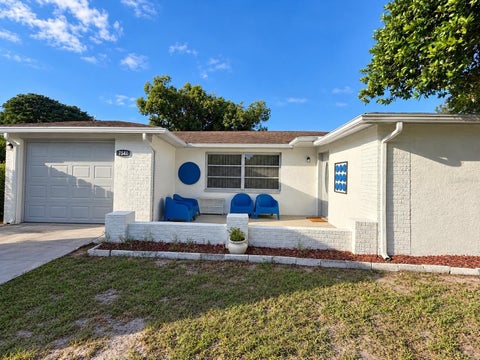 Photo of 7541 Ilex Drive, Port Richey, FL 34668 (MLS # TB8561274)
