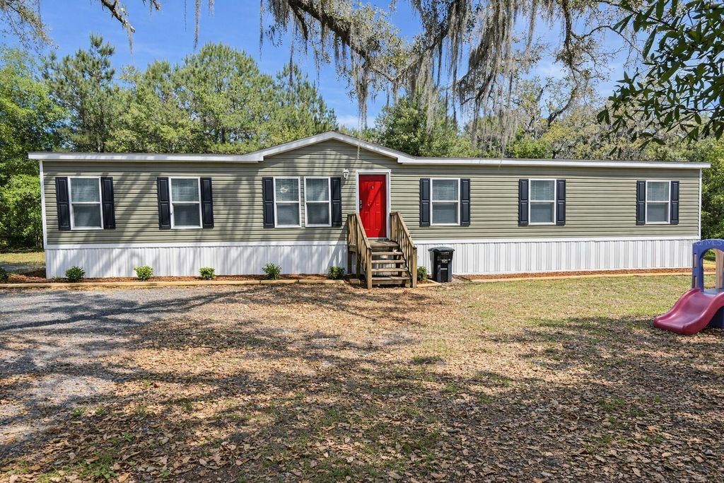 Photo of 276 NW Battle Hill Lane, Lake City, FL 32055 (MLS # O6401427)