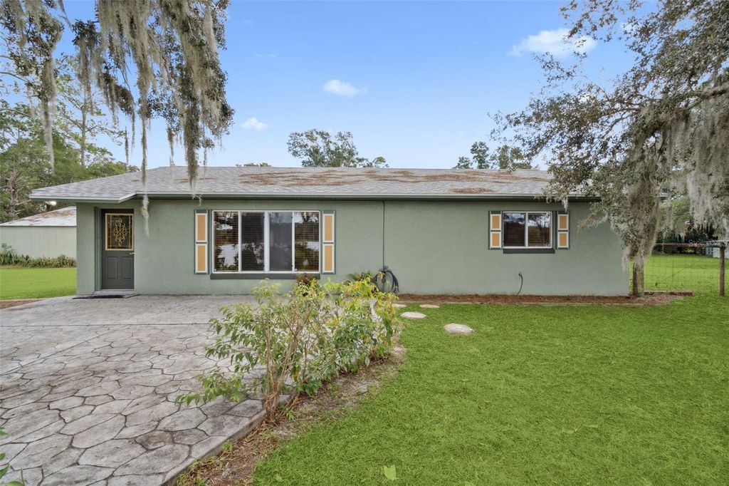 Photo of 1210 Gem Lane, Lake Helen, FL 32744 (MLS # V4945494)
