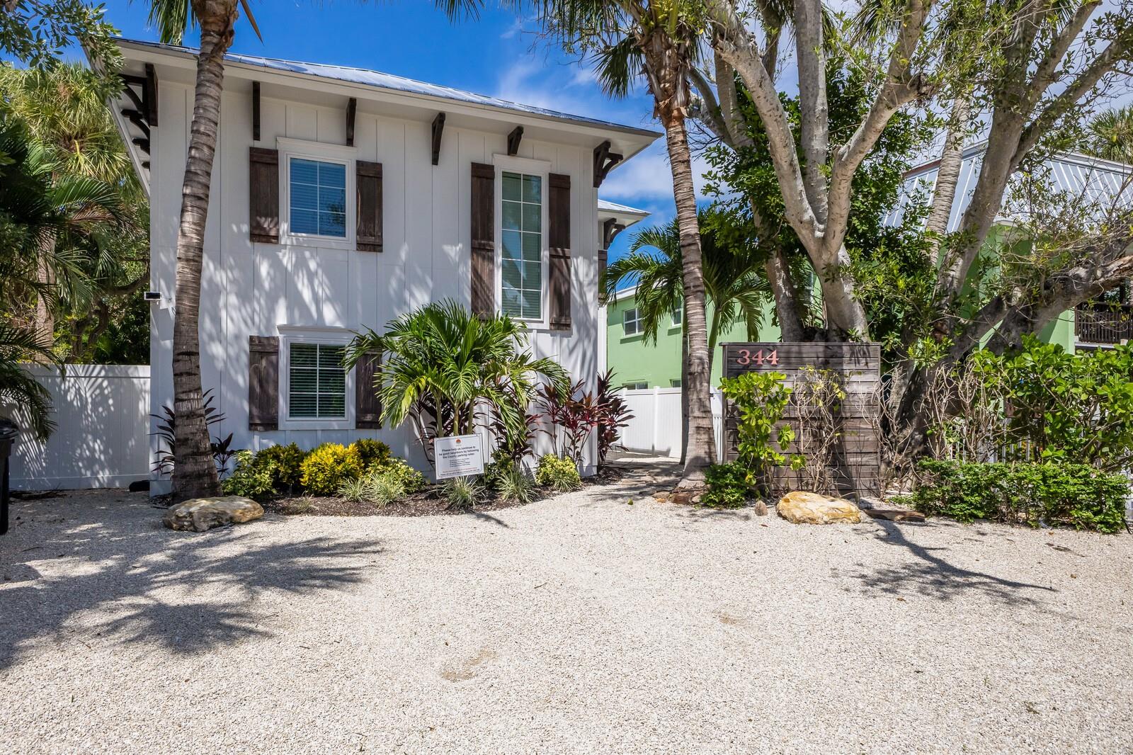 Welcome to Island House, your ultimate island retreat, tailor-made to host an unforgettable Siesta Key vacation. Nestled just minutes away from the renowned Siesta Beach and Siesta Key Village, this exquisite vacation haven is designed to offer you the perfect blend of comfort and luxury. With a private pool featuring an exhilarating waterslide and a separate guest suite, your every need is catered to. Island House boasts a total of seven bedrooms and six bathrooms, with six of those bedrooms found in the main house, and an additional bedroom in the private suite for those seeking extra privacy. The main house greets you with a spacious and inviting living area, creating a perfect gathering spot for you and your guests to relax and unwind after a day filled with adventure. Your family's culinary aficionado will revel in the fully equipped modern kitchen, adorned with coastal finishes and all the amenities you'll need for your culinary endeavors. Meals can be savored at the kitchen counter or in the adjacent casual dining area, which complements the elegant dining room seamlessly. Venture to the second floor, and you'll discover five of the seven bedrooms and four of the six bathrooms. The primary bedroom is your tranquil vacation sanctuary and features an ensuite bathroom. The second bedroom also offers an ensuite bathroom with a shower and tub combination. The third bedroom showcases cheerful coastal décor and a spacious closet. Meanwhile, the fourth and fifth bedrooms are thoughtfully designed to delight younger guests. On the main floor, you'll find the sixth bedroom, featuring ample closet space and utilizing the shared hallway bathroom with a stunning walk-in shower. For those guests seeking more privacy and personal space, the private suite is the perfect solution. It offers a separate entrance and includes a TV, a convenient mini fridge, and a luxurious ensuite bathroom featuring a shower and tub combination. Island House also beckons you to experience a private backyard oasis where the fun never ends. Zoom down the waterslide and make a splash in the private pool. After your adventures exploring Siesta Key, unwind in the hot tub and let it soothe you. Engage in enjoyable conversations with your guests at the outdoor dining area and savor delicious meals prepared on the grill. Whether you're seeking relaxation or excitement, Island House is ready to make your Siesta Key vacation truly extraordinary. THIS PROPERTY IS A SUCCESSFUL RENTAL PROPERTY WITH PROVEN RENTAL INCOME AND FORWARD BOOKINGS IN PLACE!