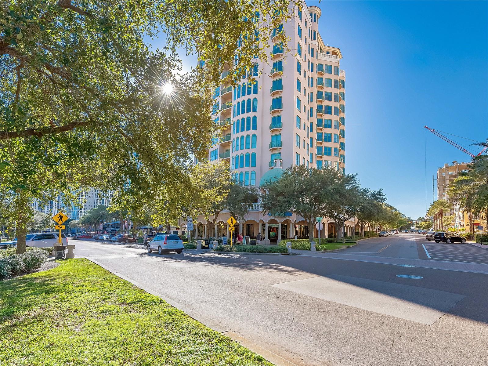 With spectacular views of Tampa Bay—from Pier Park to the Dali Museum and beyond—this exceptional residence offers an unmatched blend of luxury, lifestyle, and location in the heart of downtown St. Petersburg. Thoughtfully updated with designer finishes throughout, the open floor plan showcases water views from the kitchen, dining, living areas, and the primary suite. The chef’s kitchen features quartz and marble countertops, premium stainless steel appliances including a 6-burner gas range, convection oven, and wine refrigerator—perfectly appointed for both everyday living and elegant entertaining. Floor-to-ceiling windows bathe the interiors in natural light and are outfitted with electric blinds for effortless control. The spacious primary suite is a private sanctuary, complete with a deep soaking tub, oversized walk-in shower with dual heads, dual vanities, and generous custom walk-in closets. A well-proportioned guest room and a versatile den or office—easily used as a third bedroom—offer flexibility and comfort. A full laundry room adds to the home’s thoughtful functionality. Residents enjoy a full suite of luxury amenities, including secure entry, concierge service, a heated resort-style pool, state-of-the-art fitness center, billiards lounge, club room, catering kitchen, and an outdoor pavilion ideal for al fresco gatherings. This home includes two secured garage parking spaces, a private, air-conditioned storage locker on the sixth floor, and an additional secured storage unit in the garage. Owners also have exclusive access to a beautifully appointed two-bedroom guest suite available for short-term stays—perfect for hosting family and friends. Just beyond the elegant lobby, Beach Drive unfolds with its renowned museums, vibrant art scene, award-winning dining, boutique shopping, and miles of waterfront parks. Whether heading to brunch, catching an exhibit, or enjoying a peaceful marina stroll, this address places you at the cultural and coastal heart of the city. Offered with the option of fully furnished for turnkey living. Schedule your private showing today.