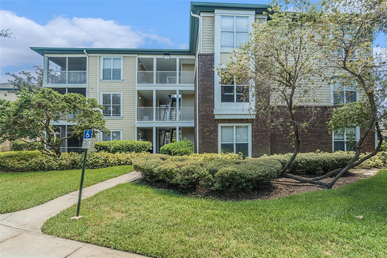 The Landings Condominium complex is popular and conveniently located in Carrollwood, and features a beautiful community pool, Club House, Tennis Courts, Sand Volleyball, and designated pet playground. This Just Listed Cozy condo in Building 6 is on the second floor and has a private patio where you can read, sun and grow your favorite fun potted plants. The owner has updated all features in the 1 bedroom, 1 bathroom, including luxury vinyl flooring, modern bathroom finishes, shelving in the walk in closet, new kitchen appliances, and creating an eating area with an open kitchen. The Living Area is bright with a lot of natural light, is generously sized and has a sliding door to your private patio. The bedroom is right sized and boasts a large walk in closet. The Milestone Inspection was completed in 2023. This lovely condo unit is move-in ready- come check it out! Please allow 24 hour notice for showings so that sweet Bruno can go to the doggy daycare.