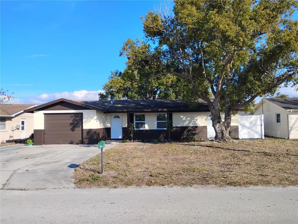 Photo of 11234 Areca Drive, Port Richey, FL 34668 (MLS # TB8460755)