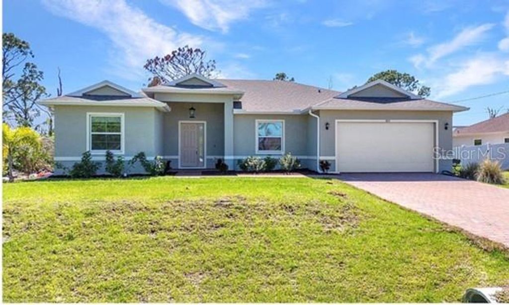 Photo of 1871 Braddock Avenue, North Port, FL 34288 (MLS # A4698169)