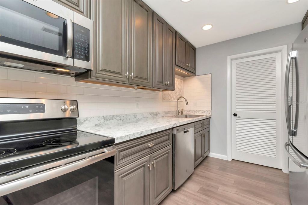 Photo of 1200 Tarpon Woods Boulevard #M8, Palm Harbor, FL 34685 (MLS # TB8385032)