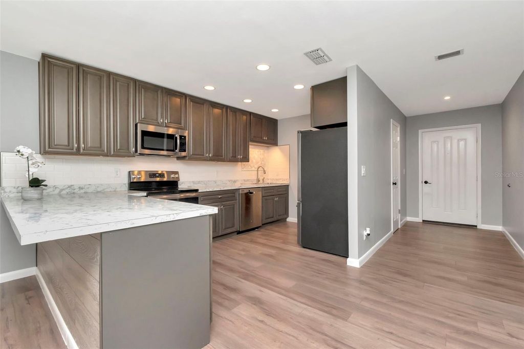 Photo of 1200 Tarpon Woods Boulevard #M8, Palm Harbor, FL 34685 (MLS # TB8385032)