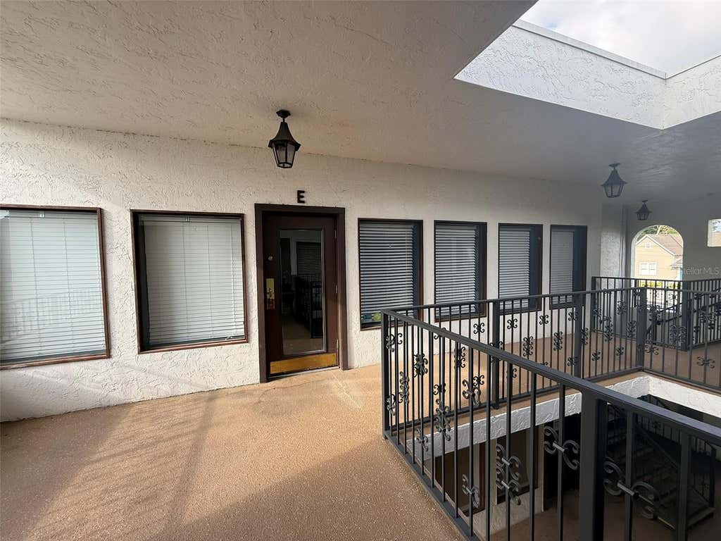 Photo of 814 E Silver Springs Boulevard #E, Ocala, FL 34470 (MLS # OM727400)