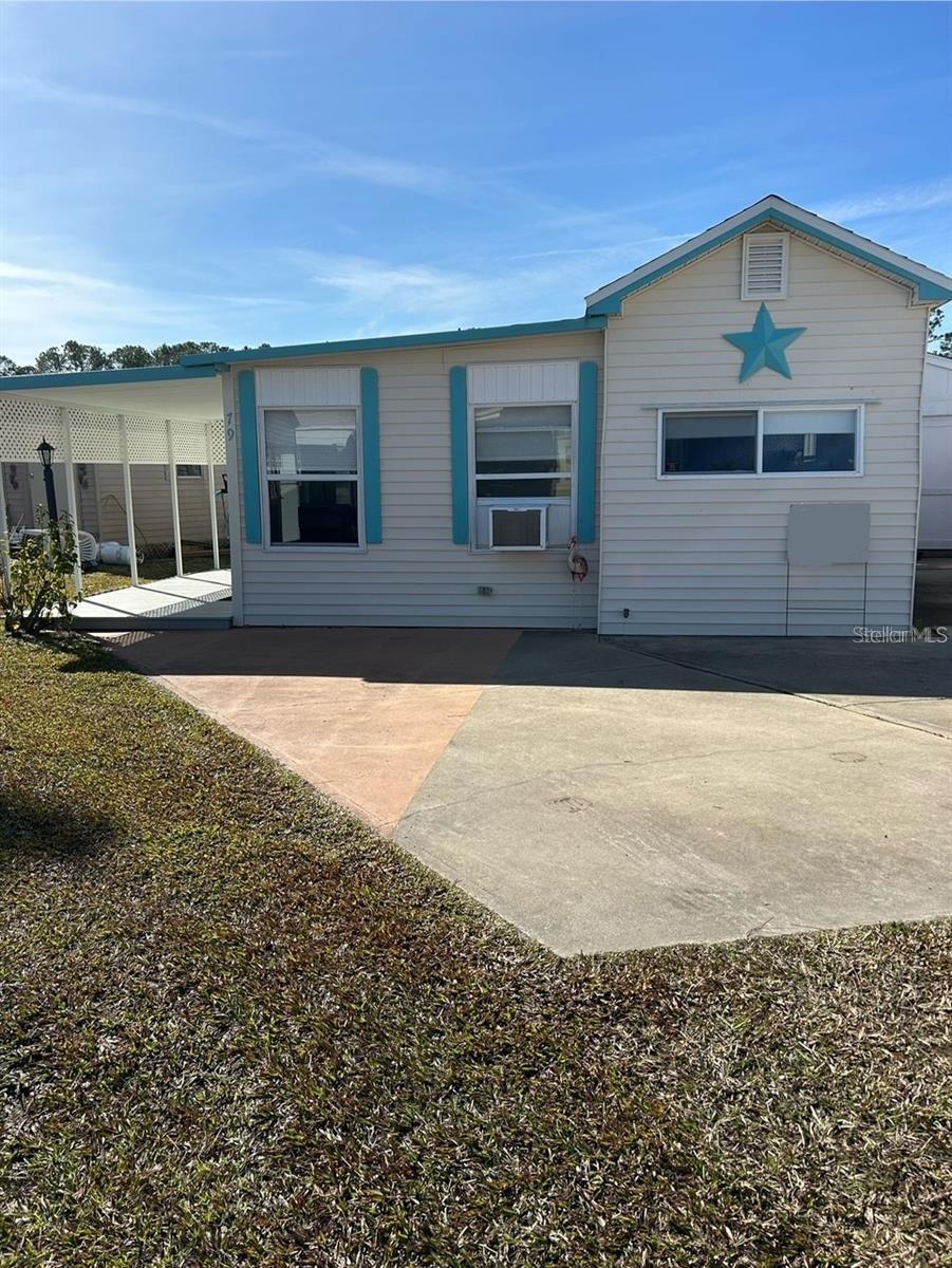 Photo of 79 Eagle Point S, Osteen, FL 32764 (MLS # V4950550)