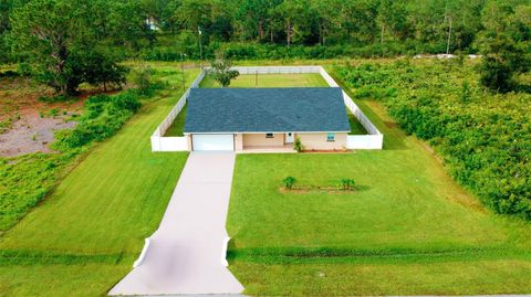 A home in INDIAN LAKE ESTATES