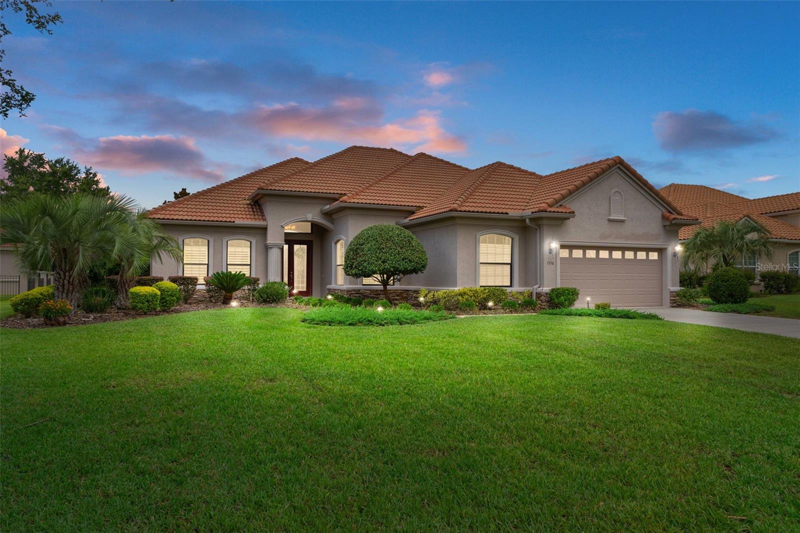 CASUAL ELEGANCE ABOUNDS in this enhanced DALI floorplan in the highly desirable & separately gated Bellamy Ridge in the PREMIERE GATED COMMUNITY of TERRA VISTA at Citrus Hills. This quality-built home is perched 89 Ft ABOVE SEA LEVEL, ensuring peace of mind (safe from storm surge & no flood insurance required). The spectacular 3 bed/2.5 bath home features a generous great room, large primary suite, spacious den/study, a cook's kitchen w/adjacent dining area, a SPLIT FLOOR PLAN w/2 guest bedrooms - each w/its own sink/vanity & an adjoining Jack & Jill bath, ideal for guests. The rear guest bedroom is currently configured as a sitting room but makes a great bedroom overlooking the secluded backyard. The LEADED GLASS ENTRY DOOR illuminates the entry foyer, guiding you to the warm HARDWOOD FLOORS that enhance the great room, and extend into the kitchen & dining area. A Quartz counter breakfast bar separates the great room from the kitchen where there's plenty of storage in 42” upper cabinets, deep bottom drawers, & a LARGE PANTRY w/sturdy wooden shelves. The 5-burner gas cooktop, built-in wall oven, & quality stainless steel appliances round out the kitchen. You'll appreciate the additional built-in storage in the interior laundry room - located just off the kitchen. The spacious primary suite is split away from guest bedrooms, overlooks the spacious backyard & patio. Enjoy your own spa-like experience in the primary bath, featuring a separate soaking tub and a frameless walk-in shower. The large vanity w/dual sinks (separated by a make-up vanity), private water closet, and spacious linen closet complete the primary bath. The large walk-in closet is enhanced w/a built-in closet organization system. This beautiful home is adorned w/popular additional features such as PLANTATION SHUTTERS, CROWN MOLDING, HARDWOOD FLOORS, EXTENDED CABINETRY, ADDED RECESSED LIGHTING, EPOXY COATED GARAGE FLOOR, & more. The YEAR-ROUND FLORIDA ROOM is ideal for entertaining w/its own split AC/Heat system, ENERGY EFFICIENT Tinted Windows, & MOTORIZED SUNSHADE. Its versatility provides a variety of options for the use of this space. From here, exit outside to the EXPANSIVE PAVER PATIO, great for BBQs, yet still leaving plenty of room to add a pool on this oversized lot. Storage abounds in this great home & in the 2.5 Car OVERSIZED GARAGE w/EPOXY FLOOR. This well-maintained home is move-in ready. Start living the FLORIDA LIFESTYLE you’ve dreamed of in this VALUE-PRICED QUALITY-built home and partaking in the WORLD-CLASS AMENITIES of Citrus Hills. Schedule your showing today!
