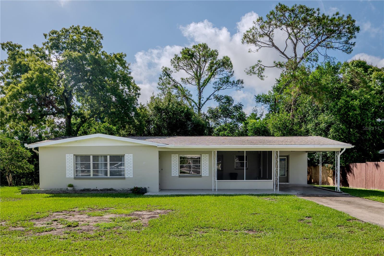 Two bedrooms 1 1/2 baths with indoor laundry. New sinks and faucets, freshly painted kitchen cabinets and new bathroom vanity. Brand new air conditioner. Appliances one year old.