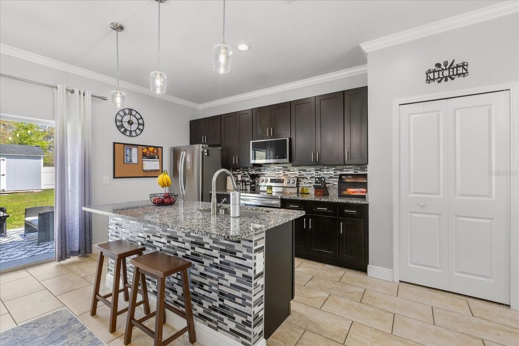 Photo of 13657 SW 33rd Circle, Ocala, FL 34473 (MLS # O6386962)