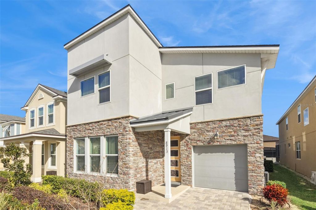 Photo of 8913 Coconut Breeze Drive, Kissimmee, FL 34747 (MLS # O6372799)