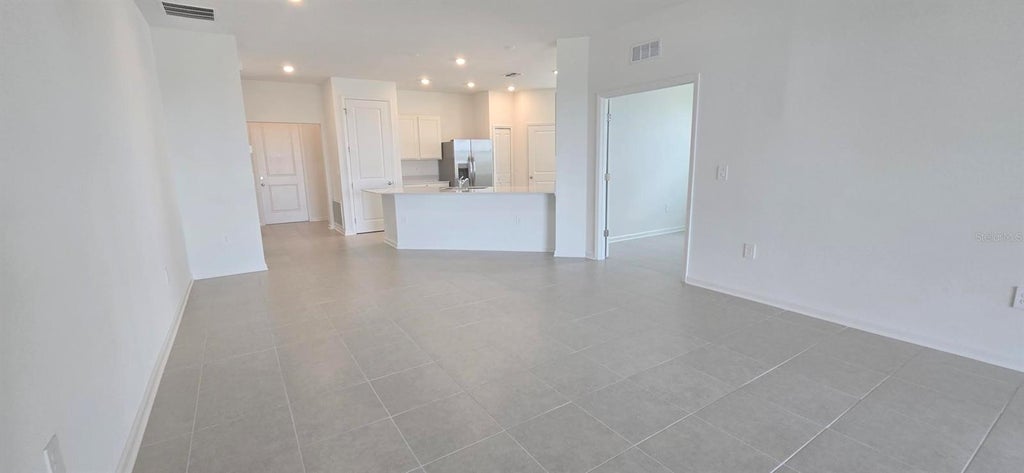 Photo of 3024 Chicago Avenue, Haines City, FL 33844 (MLS # O6448642)