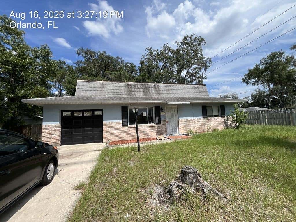 Photo of 4409 Watch Hill Road, Orlando, FL 32808 (MLS # O6434982)