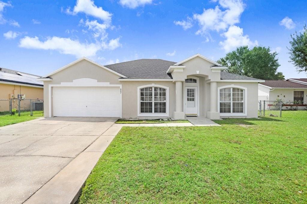 Welcome to 887 Jarnac Dr, Kissimmee, FL. This spacious 3-bedroom, 2-bathroom home offers an inviting and functional layout perfect for everyday living. Inside, you’ll find cohesive vinyl plank flooring throughout, a bright eat-in kitchen, a comfortable living room, and a separate family room.
The primary bedroom includes a walk-in closet, while both guest bedrooms offer ample space and natural light. Step outside to a fenced-in backyard, ideal for pets, play, or enjoying the Florida sunshine.
Perfect for first-time buyers, families, or investors looking for a well-maintained property with plenty of charm.