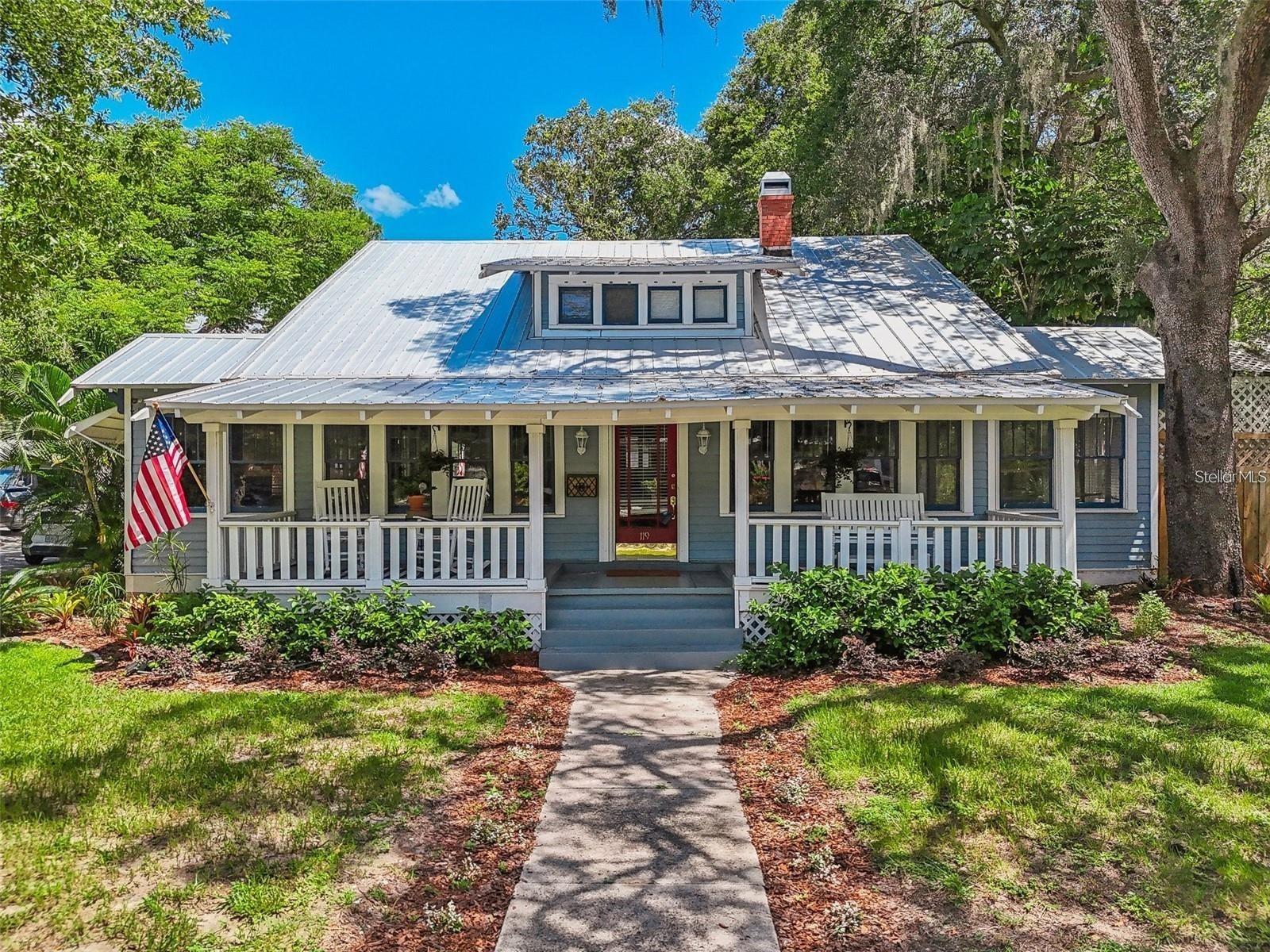 This beautifully maintained 1930 Craftsman home is a true Seminole Heights gem! Just steps away from some of the neighborhood’s best dining options! This 4-bedroom, 2-bathroom home offers an exceptional blend of historic charm and modern convenience. The inviting front porch leads into a stunning entry foyer with original built-ins, setting the tone for this thoughtfully designed home. The spacious layout includes an office/den off the dining room and a flex space adjacent to the living room. Situated on an oversized corner lot, the backyard is an entertainer’s dream! With a deck and a spacious concrete pad—perfect for RV/boat parking. The private upstairs primary suite is a retreat of its own, featuring two walk-in closets, a generous ensuite bathroom. Recent updates include a metal roof (2021, 20-year transferable warranty), updated kitchen (2022), refinished oak floors (2022), tankless water heaters (2021 & 2022), HVAC (2019), privacy fence (2023), and a new concrete driveway & backyard pad (2023). Just one block from Henry & Ola Park and the Hillsborough River, this home blends historic character with modern upgrades in a prime location. Don’t miss out—schedule your showing today!