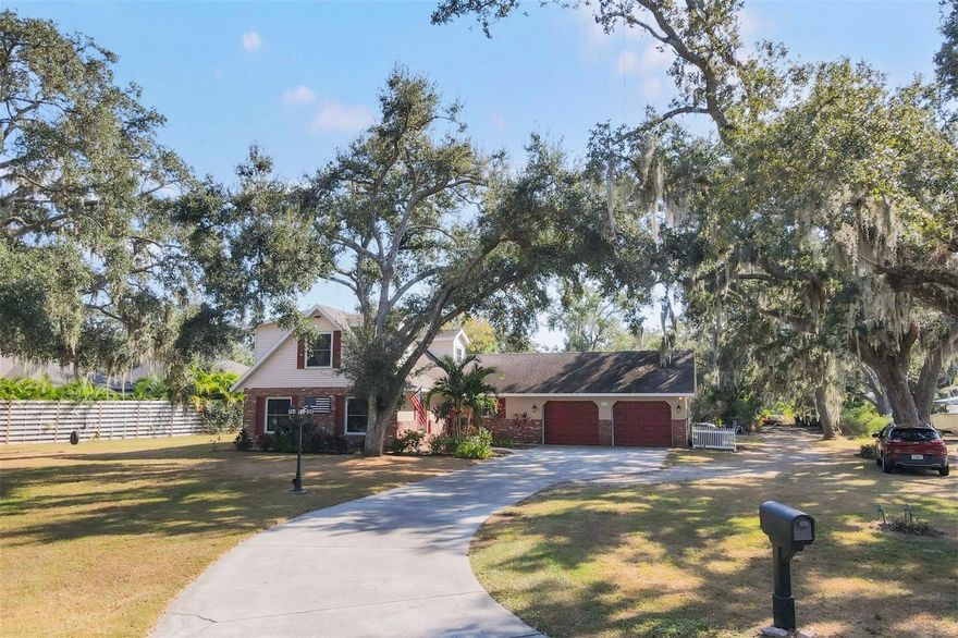 Imagine coming home to a peaceful retreat with over an acre of land and a private pond. This one-owner two-story pool home is perfectly situated at the end of a quiet cul-de-sac in the heart of Sarasota. This residence offers privacy and charm with tranquil pond views from the backyard and direct water access for kayaking or relaxing by nature. Inside, you'll find three spacious bedrooms and two-and-a-half bathrooms with luxury vinyl plank flooring throughout the main living areas. The inviting family room features a cozy fireplace, while the living and dining room combination creates the ideal setting for entertaining or every day living. The eat-in kitchen provides plenty of space for casual meals with a view of the pool and yard. Recent updates include a new air-conditioning system (2025) and impact windows for peace of mind. The two-car garage includes the laundry area and plumbing already in place for a future half bath that connects conveniently to the pool area; perfect for outdoor gatherings. Step outside to your private screened pool and patio, surrounded by mature trees and lush landscaping, creating a serene outdoor retreat. No CDD or HOA fees, so bring your boat or RV! Located close to Sarasota's best beaches, dining, shopping, and top schools, this home blends solid construction, modern comfort, and a quiet cul-de-sac setting for the perfect Florida Lifestyle.