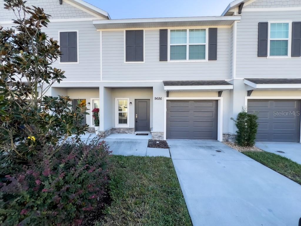 Calusa Creek is a townhome community in Riverview, FL. This charming 3 bedroom, 2/1 bathroom was built in 2021 and shows like it is still brand new! This home has a large, open living room/dining room/kitchen combination area on the first floor, great for gathering family and friends! Upstairs, find three spacious bedrooms and a convenient laundry closet which includes the washer and dryer. The patio outside the living room provides an area for grilling or lounging and enjoying the backyard! The garage is roomy enough for your vehicle plus storage. Energy efficient features include a 15 SEER A/C unit with programmable thermostat and double-pane Low-e windows. Enjoy the community amenities of pool and doggie park. This community´s convenient Riverview location has easy access to US 301 and I-75, and is close to shopping, entertainment, services, and top-rated schools.