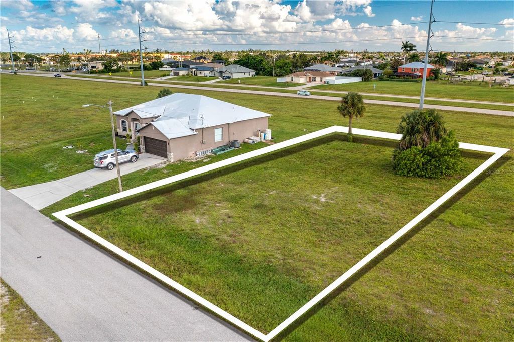 Photo of 1718 NW 8th Terrace, Cape Coral, FL 33993 (MLS # O6145636)