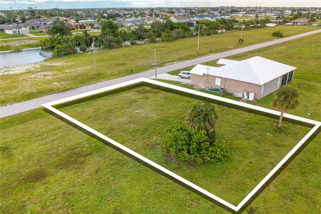 Photo of 1718 NW 8th Terrace, Cape Coral, FL 33993 (MLS # O6145636)