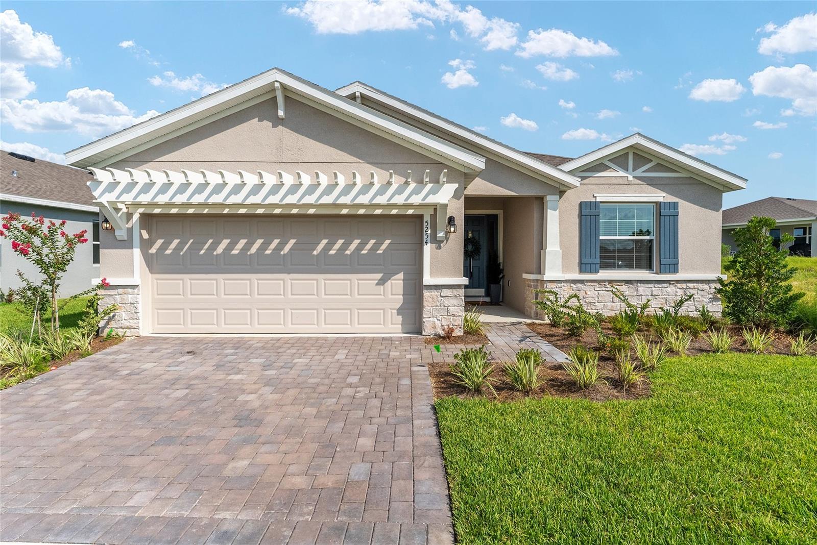 Experience Unrivaled Luxury & Convenience in Ocala Preserve!
Discover the ultimate in elevated living with this brand-new, beautifully constructed smart home available for short-term rental within the highly sought after Ocala Preserve community. Perfectly situated just minutes from the World Equestrian Center (WEC), premier shopping, exquisite dining, and all of Ocala's vibrant attractions, this 3-bedroom, 2-bathroom gem offers an unparalleled stay.
Completely Turnkey – All You Need is a Suitcase!
Step inside and be greeted by a sleek foyer leading to an open, inviting layout. The formal dining area and spacious living room set the stage for relaxing evenings or entertaining guests. Just beyond, the expansive gourmet kitchen awaits, featuring:
Stunning granite countertops
Solid wood cabinetry
Premium stainless steel appliances
An additional cozy dining space overlooking the backyard
Luxurious Accommodations: The serene primary bedroom is a true retreat, boasting a comfortable king-size bed, a generous walk-in closet, and a spa-like ensuite bathroom. Indulge in the dual sink vanity, a spacious walk-in shower, and a separate soaking tub for ultimate relaxation.
The two additional guest bedrooms are thoughtfully appointed for comfort and versatility: one features two comfortable twin beds, and the other offers a lovely queen-sized bed. Both guest rooms share a well-appointed guest bathroom, complete with a granite vanity and a convenient shower/tub combination.
Outdoor Oasis & Unmatched Convenience: At the rear of the home, a screened-in porch provides a tranquil spot to unwind, overlooking the private backyard.
Enjoy a truly hassle-free stay with an all-inclusive rental package covering:
Utilities (with a cap)
HOA fees
Professional grounds care
Repairs
High-speed WiFi
Cable television
Trash collection
Pest control
Two professional cleanings a month
This smart home in Ocala Preserve is more than just a rental; it's a luxurious experience designed for your comfort and convenience. Don't miss the opportunity to make this your perfect Ocala retreat!