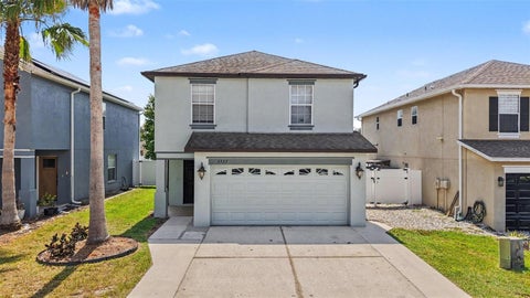 Photo of 3327 Thistledown Lane, Land O Lakes, FL 34638 (MLS # TB8522767)