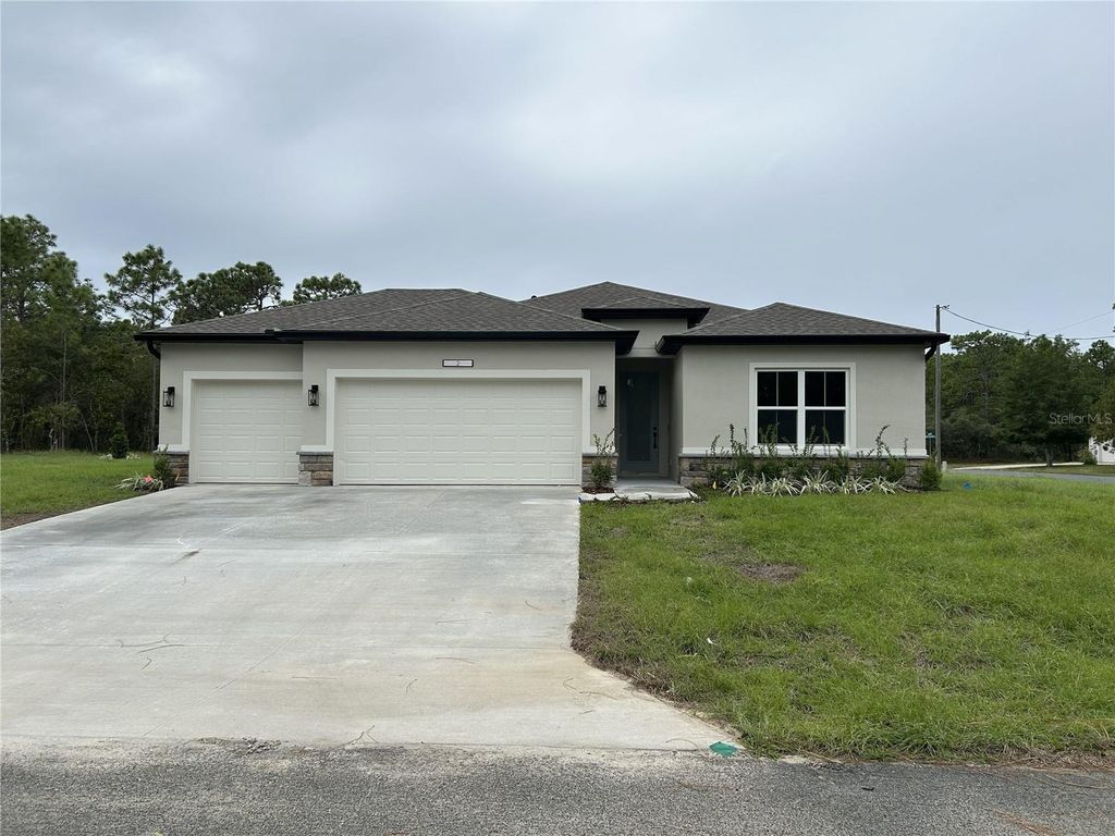 Photo of 5887 N Bedstrow Boulevard, Dunnellon, FL 34434 (MLS # P4938820)