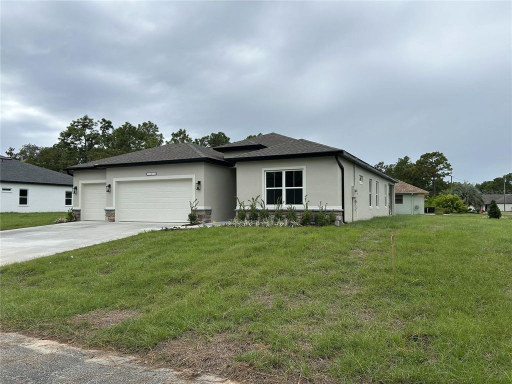 Photo of 5887 N Bedstrow Boulevard, Dunnellon, FL 34434 (MLS # P4938820)
