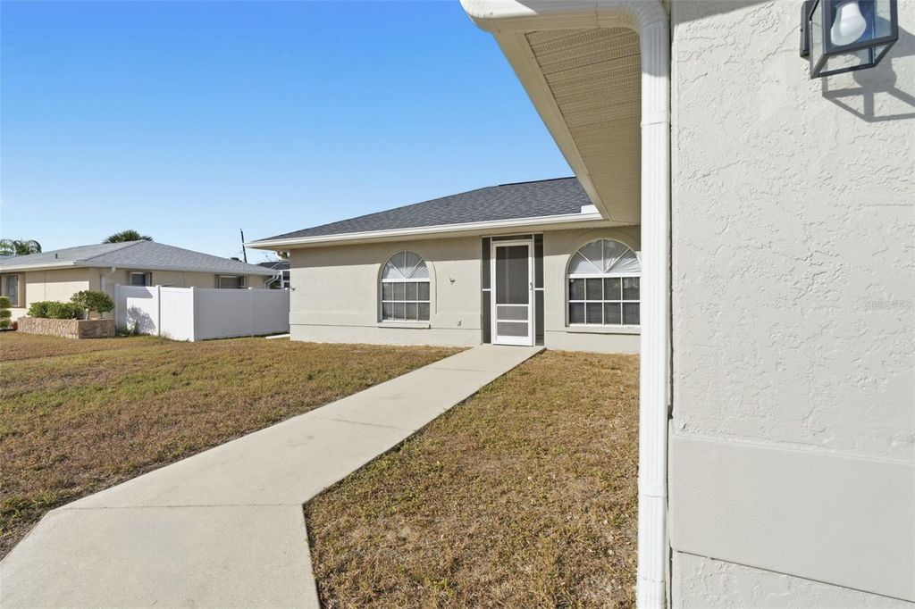 Photo of 520 Meridan Avenue NW, Port Charlotte, FL 33952 (MLS # C7519579)