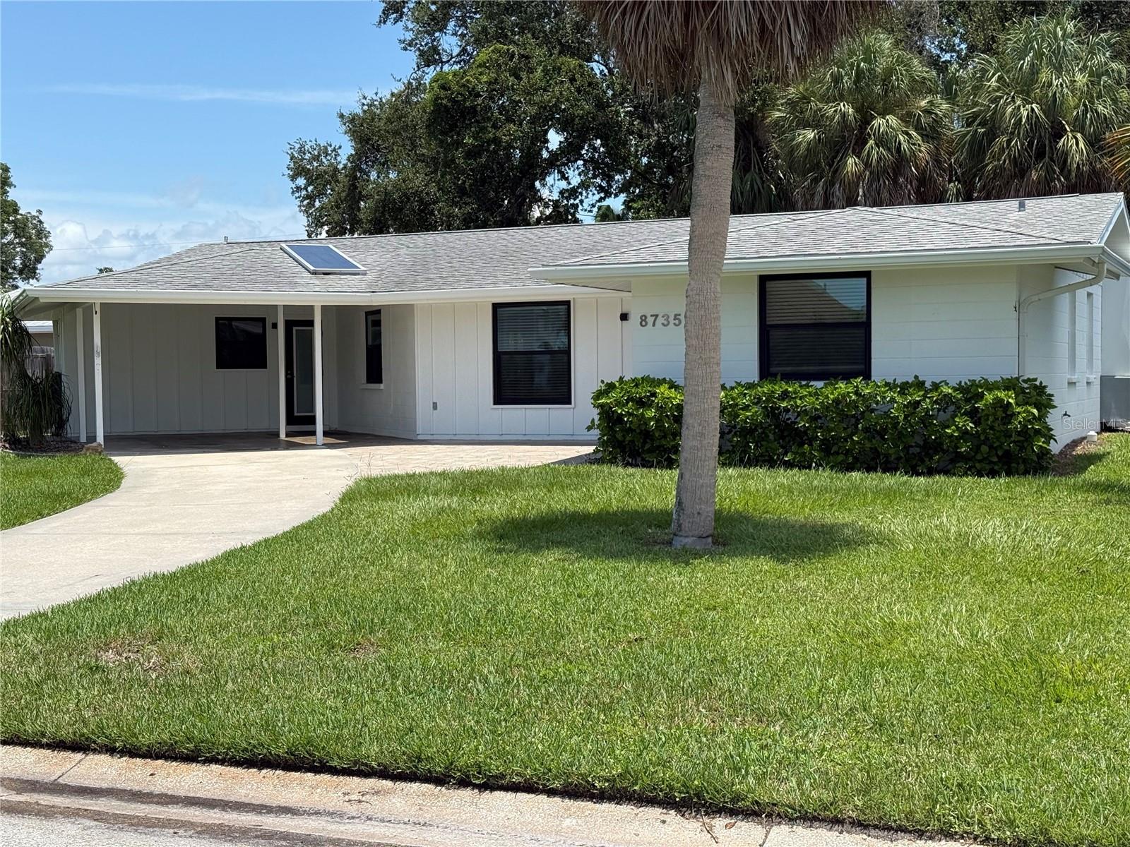 Welcome to this incredibly charming two-bedroom, two-bath home, perfectly situated in one of Sarasota’s most desirable locations. From the moment you arrive, you’ll notice the spectacular setting; enjoy peaceful glimpses of the bay from your front yard and take advantage of the neighborhood’s voluntary association, which offers access to a private boat launch, community amenities, and unbeatable boating with no fixed bridges, all for a minimal fee ( visit https://www.tropicalshorescc.com/ for more details). Step inside and be captivated by the light, bright, and airy feel of this home. Stunning terrazzo floors flow throughout, complementing an upgraded kitchen with granite countertops and two spacious, beautifully appointed bathrooms. An indoor laundry room adds convenience, while the open layout makes the home feel inviting and comfortable. Outside, the massive fully fenced backyard offers a park-like oasis; perfect for relaxing, entertaining, or simply enjoying the Florida lifestyle in total privacy. The location is simply unbeatable: minutes from shopping, hospitals, restaurants, and just 10 minutes to world-renowned Siesta Key Beach or 15 minutes to vibrant downtown Sarasota. This home truly offers it all; charm, privacy, access to the bay, and an incredible location. Opportunities like this are rare, and this one won’t last long. Schedule your private tour today and make this special place your next home!
