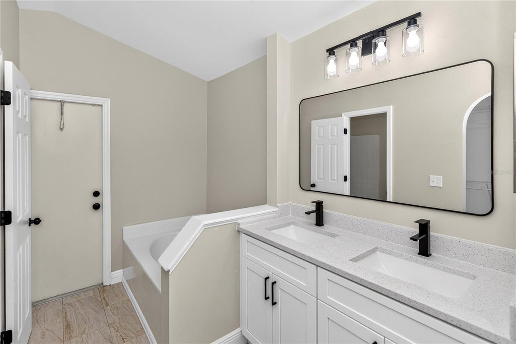 Photo of 2190 Glenlock Drive, Deltona, FL 32725 (MLS # O6431090)