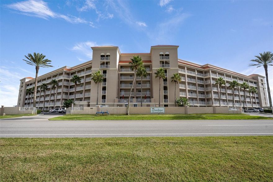 Welcome to your slice of paradise on the no-drive beach of New Smyrna Beach, FL! This beautifully renovated 2-bedroom, 2-bathroom oceanfront condo offers everything you need for a relaxing coastal lifestyle—or a lucrative investment property.  Wake up to breathtaking sunrises from your private oceanfront porch, and enjoy panoramic views of the Atlantic Ocean from the comfort of your living room or primary suite.  Inside, the condo features thoughtful updates including a brand-new A/C unit (March 2025), a newer hot water heater, and the convenience of an in-unit washer and dryer.  Perfect for families or groups, the unit comfortably sleeps 6+ with two sets of bunk beds featuring queen-size mattresses below—ideal for maximizing rental potential or hosting guests.  Located in a highly desirable Sandpiper community with a proven track record of strong rental income, this unit is a smart investment and a serene getaway all in one. Community amenities include two oceanfront geothermal pools, two baby pools, a putting green, a tennis/pickleball court, and private beach access—all just steps from your door.  Additional perks include a secure storage unit and direct access to the pristine, no-drive stretch of New Smyrna Beach.  Don't miss this rare opportunity to own a turnkey oceanfront condo—whether for personal enjoyment, investment income, or both!