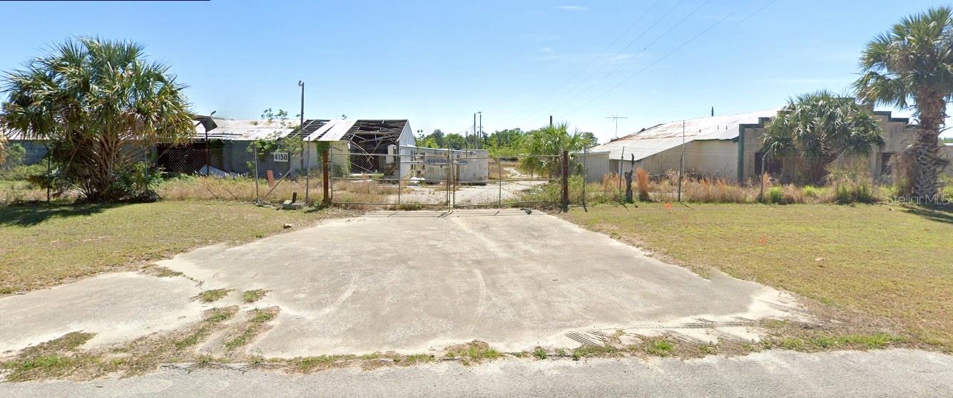 This 37+/- acre lot is in the heart of the fast expanding industrial district in Apopka, Florida. Neighbors include Amazon, Coca Cola, Goya Foods, CoPart and many warehouses and distribution centers. It is located near major arteries 441, 451, 429 which are the fast tracks to anywhere in Central Florida and beyond. A Medical Marijuana grow zone information, survey and Phase I and II environmental studies are available. The buildings are tear downs as the value is in the land. Call, text or email today to schedule a showing or inquire.