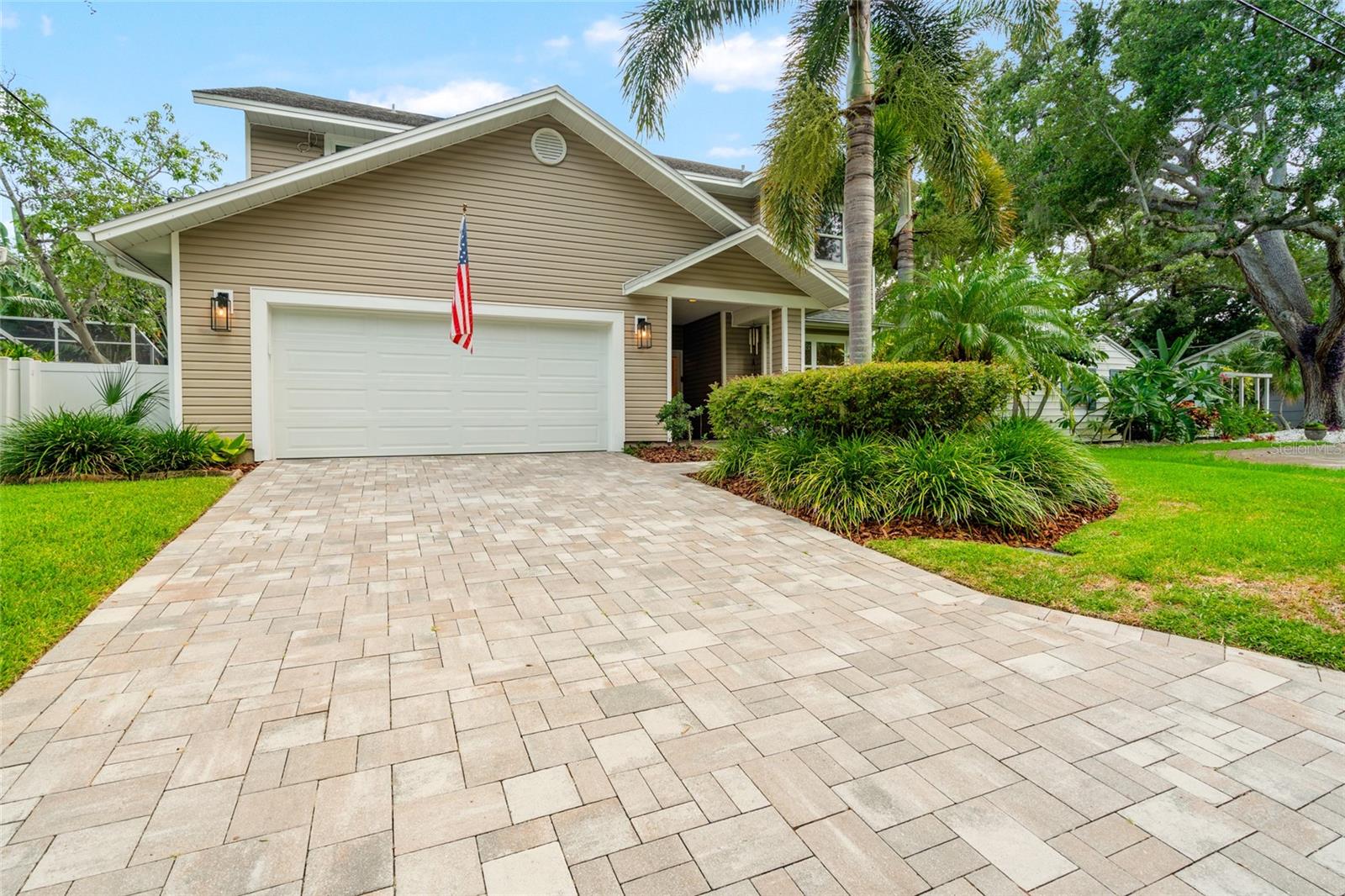 Nestled in one of South Tampa’s most beloved neighborhoods, just a few blocks from iconic Bayshore Boulevard, this beautifully updated 4-bedroom, 3-bath pool home offers the perfect blend of style, function, and location.
Step inside to find gorgeous wood flooring throughout, a bright and airy vaulted-ceiling family room, and an open-concept design highlighted by a stunning updated kitchen featuring quartz countertops, tile backsplash, and newer appliances — ideal for cooking, gathering, and entertaining.
A dramatic modern staircase with updated loft railing leads to the second floor, where spacious bedrooms offer ample closet space and flexibility for the whole household. The primary suite boasts a custom walk-in closet with built-ins and an updated en-suite bath, while the ground floor guest quarters with adjacent full bath provides the perfect setup for visiting guests or a home office.
Enjoy year-round outdoor living in your screened-in and heated pool with travertine decking, water fountain feature, and adjacent turf lawn for easy maintenance. Impact-rated hurricane windows and sliders (2024) offer peace of mind, while a paver driveway, spacious 2-car garage with ceiling storage racks, and multiple closets throughout the home ensure that form meets function.
Major updates include:
- New Impact Windows & Sliders (2024)
- Roof (2013)
- HVAC Systems (2018 & 2019)
- House sits in Flood Zone X — No Flood Insurance Required
-Top-Rated School District
Located in the heart of Bayshore Beautiful, this home gives you easy access to Bayshore’s waterfront path, top dining, shopping, and everything South Tampa has to offer.
A rare opportunity to own an updated, move-in ready pool home in one of Tampa’s most desirable locations.
