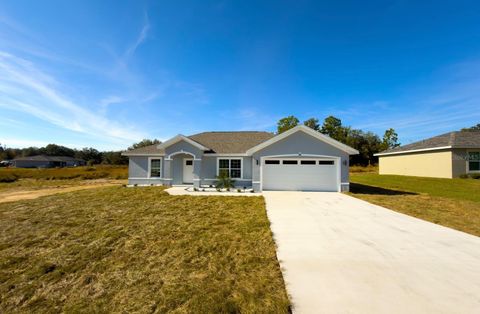 Photo of 24 Locust Loop Pass, Ocala, FL 34472 (MLS # OM713906)