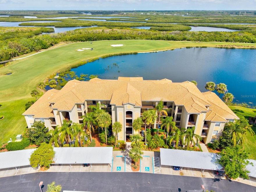 PANORAMIC GOLFCOURSE PARADISE! Hands down one of the best panoramic golfcourse views in River Strand Golf & Country Club! Enjoy absolutely gorgeous lake and golfcourse views everyday from this delightful 2Br/2Ba Brookside condo. Relax on your screened lanai as you watch golfers traverse the 7th hole of the Estuary course. This first floor unit is in pristine condition and has been lovingly updated. Updates include: luxury vinyl plank flooring throughout, white cabinets and quartz counters in the kitchen and baths, stainless steel appliances, decorator backsplash, oversized breakfast bar, crown molding throughout, screened front entry, epoxy flooring at the entry way and on the lanai, tinted sliders, sun shade on the lanai. This is truly resort style living at its best! Enjoy amazing amenities with your FULL GOLF MEMBERSHIP! River Strand features a 27-hole championship course designed by Arthur Hills. This gated community offers an exceptional clubhouse, restaurant, Tiki Bar, fitness center, aerobics room, resort-style pool, resistance pool, heated spa, 9 Har-Tru clay tennis courts, 8 pickleball courts, a second community center with another resort style pool and fitness center, and half-court basketball courts. Plenty of social activities to keep you busy too! This condo is conveniently located to tons of restaurants, shopping, I-75, the downtown areas of Sarasota and Bradenton and just a short drive to all the area world famous white sand beaches of the Suncoast! Furniture is also negotiable.
