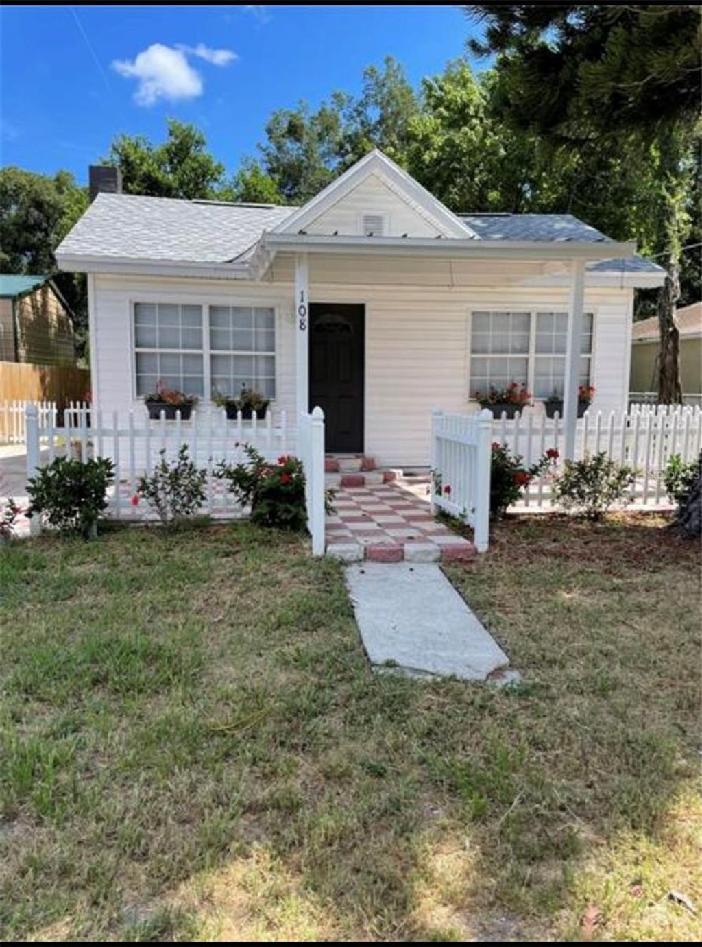 Photo of 108 E 130th Avenue, Tampa, FL 33612 (MLS # TB8437625)