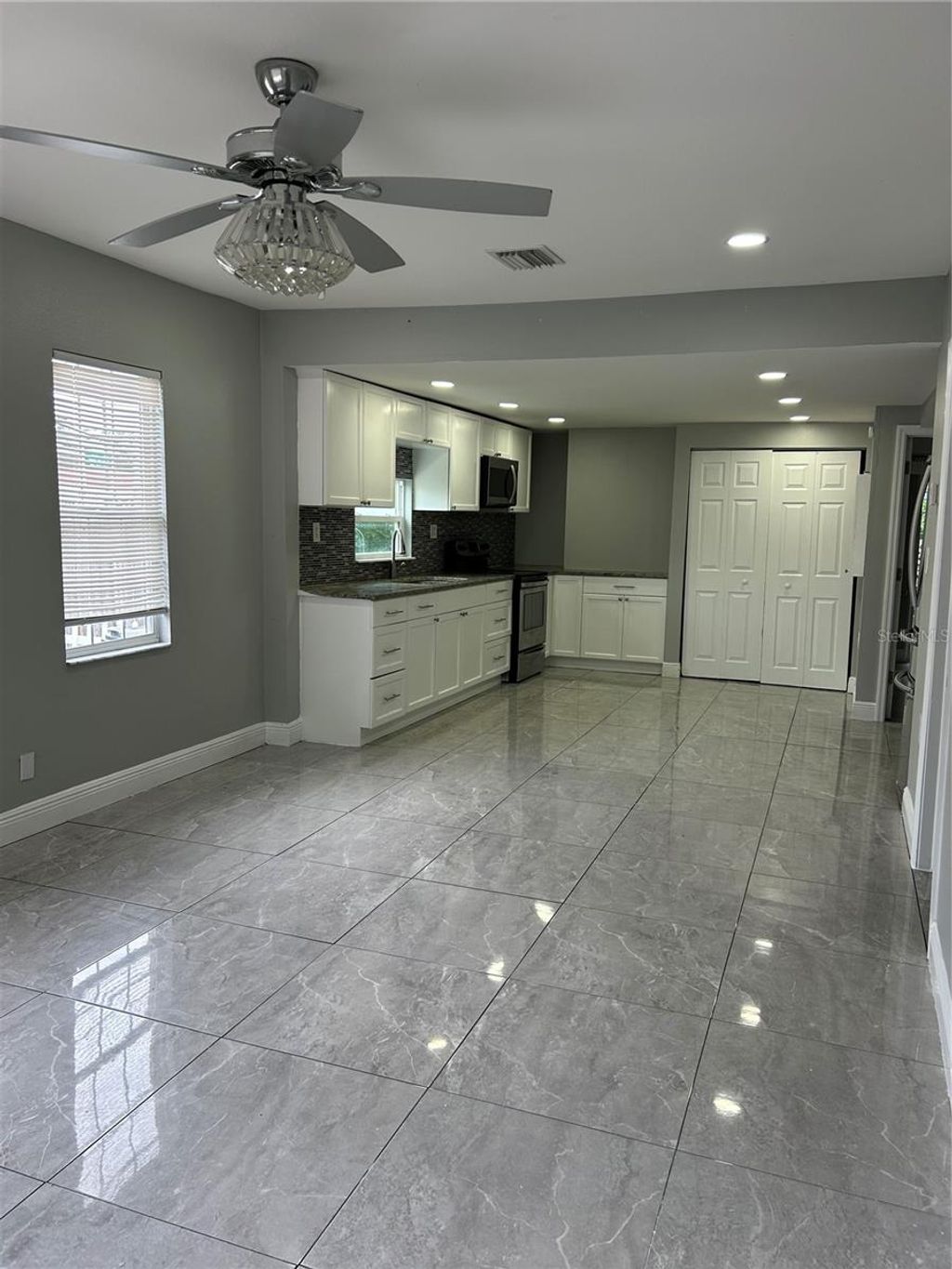 Photo of 108 E 130th Avenue, Tampa, FL 33612 (MLS # TB8437625)