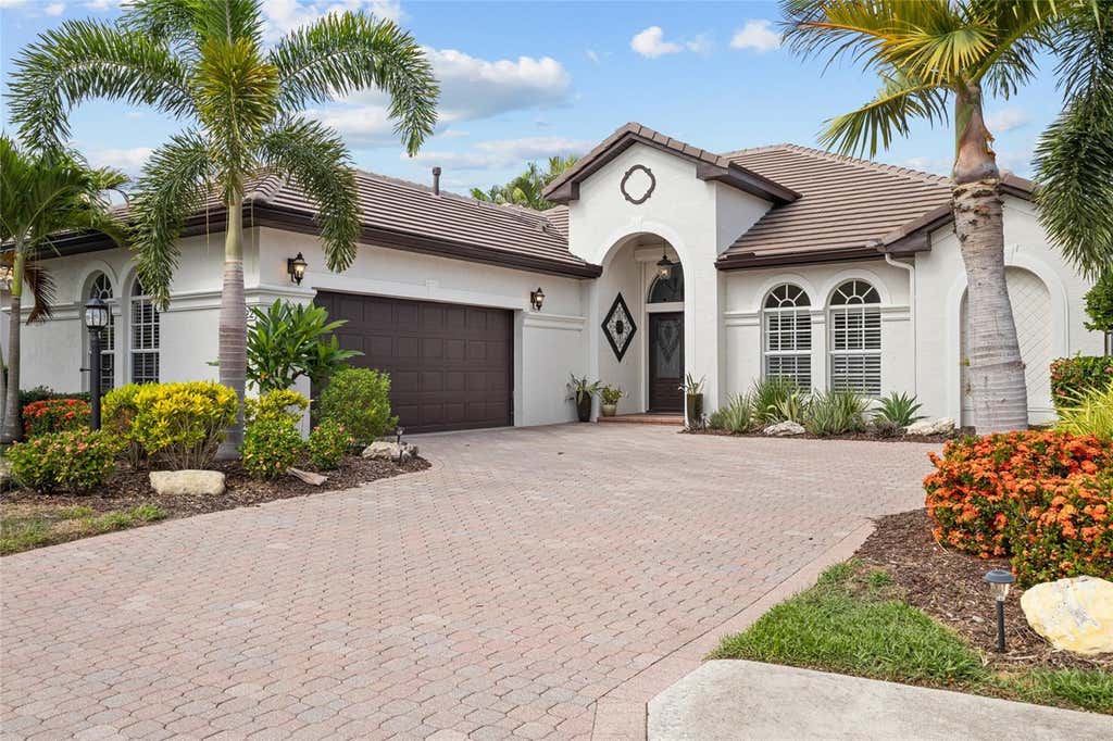 Photo of 7622 Desert Inn Way, Bradenton, FL 34202 (MLS # A4700112)