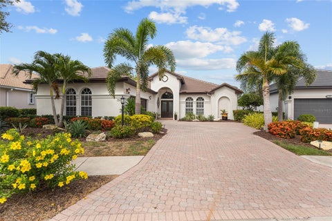 Photo of 7622 Desert Inn Way, Bradenton, FL 34202 (MLS # A4700112)