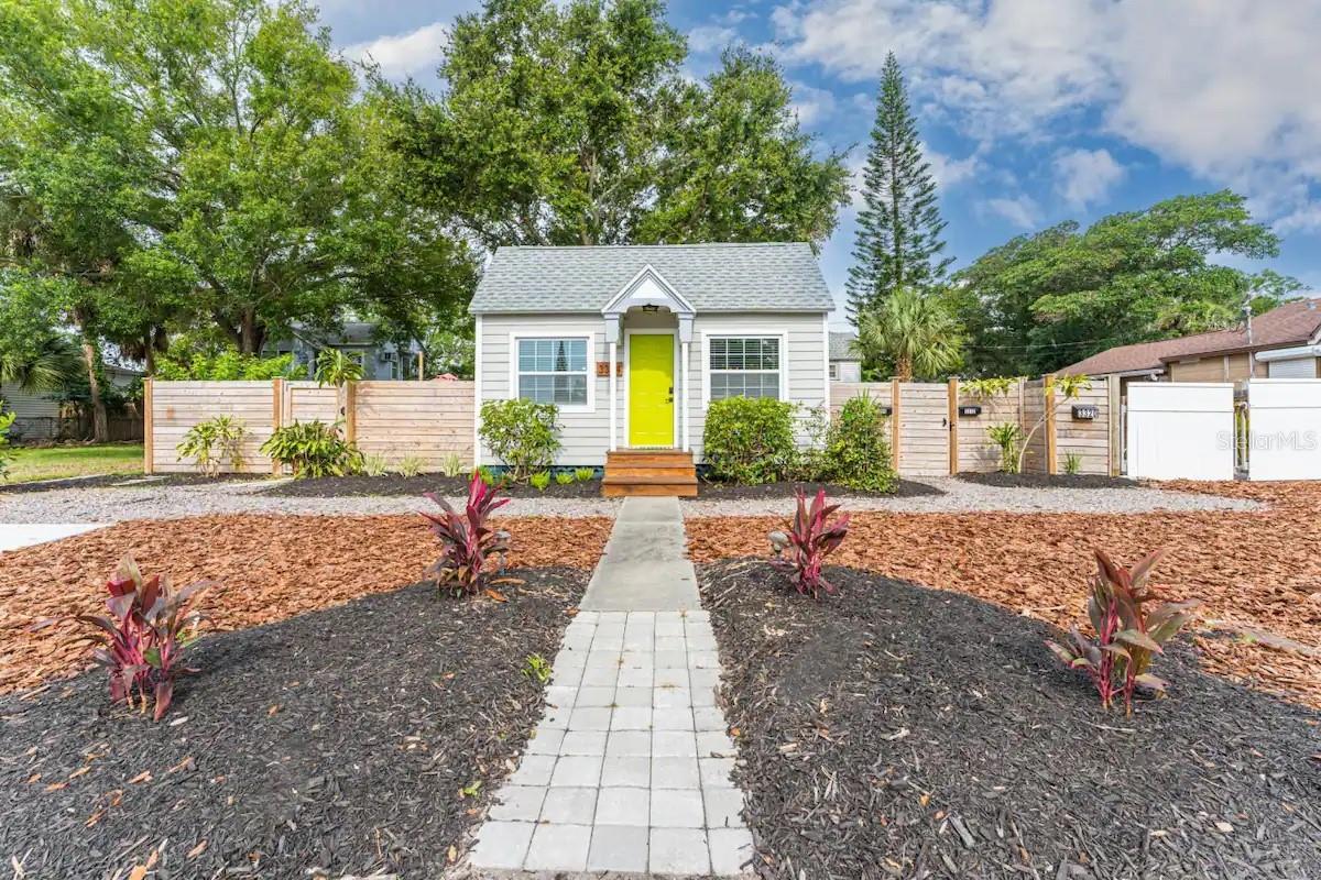 LOCATION LOCATION LOCATION!!!!!!! Stunning, Convenient & Income-Producing – The Perfect St. Pete Triplex in a NO FLOOD ZONE!!! Welcome to a rare investment gem in the heart of St. Petersburg! This adorable and updated triplex sits on a spacious double lot and is bursting with charm, privacy, and income potential. Whether you’re looking to live in one unit and rent the others, or simply expand your investment portfolio, this property delivers flexibility, value, and opportunity. As you arrive, you’ll be drawn in by the charming curb appeal and thoughtful layout. Each of the three separate units features its own private fenced backyard, dedicated parking, and extra storage space, creating distinct, peaceful retreats for tenants or owners alike. A bonus, The additional fenced lot provides ample space for RV/boat parking, extra storage, or future expansion. Unit 3314 – Fully Updated 1BR/1BA -This beautifully renovated front unit includes a bright indoor laundry room, luxury vinyl flooring, and a private backyard with wood patio/pergola. The modern kitchen boasts granite countertops, shaker cabinetry, and new appliances. The bathroom features a luxury bath/shower surround, new vanity, and stylish finishes throughout. Impact-rated windows, updated lighting, ceiling fans, and a fresh exterior cement apron complete the upgrades. Unit 3312 – Renovated 2-Story 2BR/1BA Tucked in the rear with private alley access, this fully updated unit offers a unique 2-level layout. The ground floor includes two bonus/storage rooms (one with washer/dryer), while the upper floor opens into a bright, open-concept studio with a fully updated kitchen and bathroom. Features include granite countertops, new range and microwave, SmartCore vinyl flooring, and hurricane shutters. The artificial turf backyard is a low-maintenance private oasis. Unit 3320 – 2BR/1BA with all new appliances. This 2-story unit mirrors the layout of 3312 and includes two storage rooms on the first floor and a second-level living space. Updates include landscaping, hardscaping, and artificial turf in the fenced backyard.
Additional Highlights:
* Alley access with private parking for both rear units
* New AC units installed in all units
* Gravel pad for second vehicle
* Minutes from Downtown St. Pete, restaurants, museums, and St. Pete/Clearwater Airport and the BEACH!
* Ideal for owner-occupants, long-term tenants, or short-term rental income
This is more than a home—it's a smart investment wrapped in charm. Don’t miss your chance to own this versatile, income-generating property in one of St. Pete’s most desirable areas that is NOT in a flood zone!!